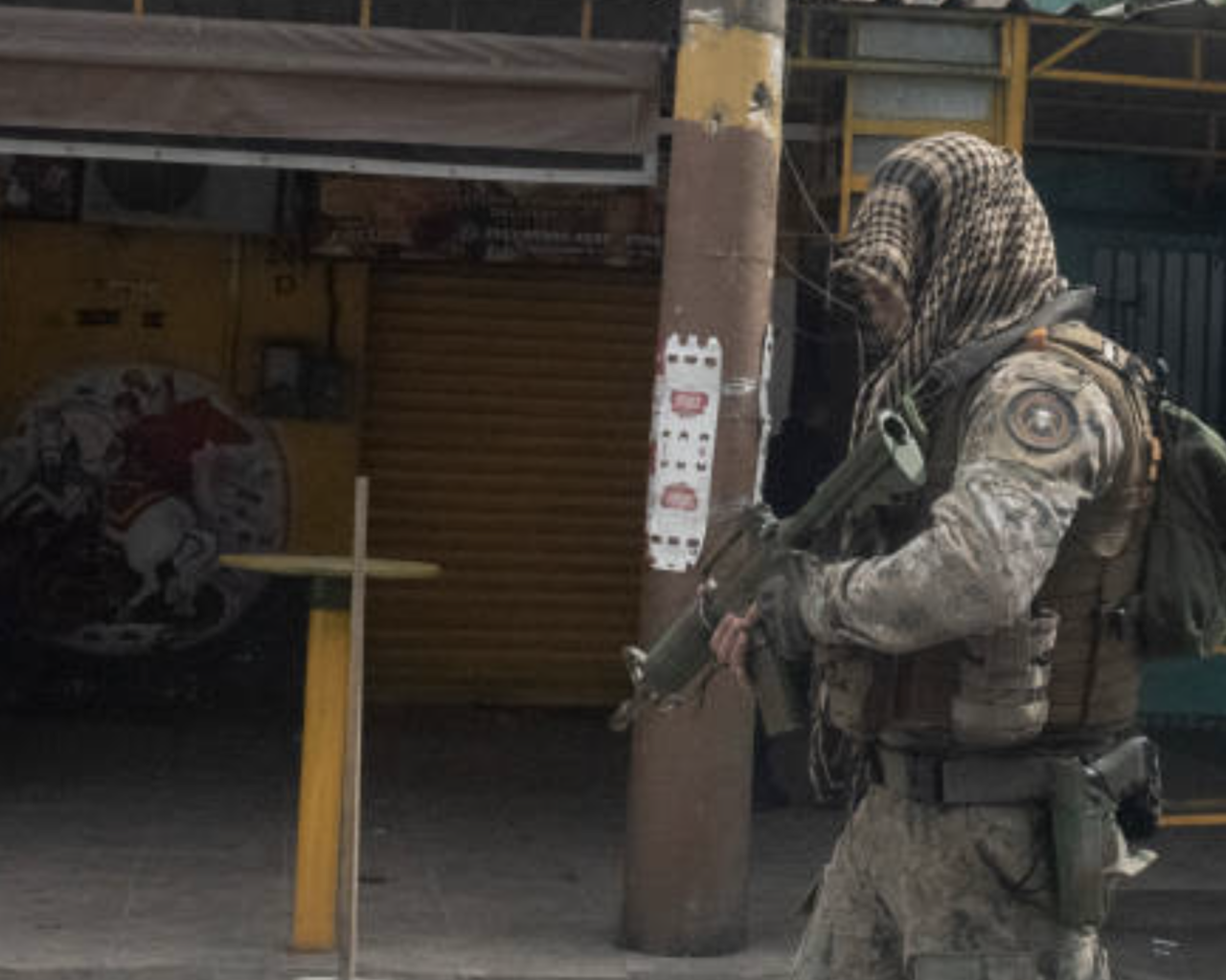 A member of BOPE [Batalhão de Operações Policiais Especiais], the tactical unit of the Colombian military police of Rio de Janeiro, is patrolling the streets during an operation amid the coronavirus pandemic, on Oct. 2020.
> Photo: Fabio Teixeira.