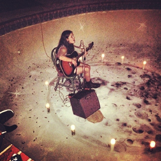 Friday night I played a show in empty pool. It was midnight during a new moon. Candles