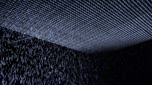 dailyfeatorial:  Rain Room - by rAndom International  Rain Room is a hundred square metre field of falling water through which it is possible to walk, trusting that a path can be navigated, without being drenched in the process. As you progress through