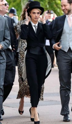 cheskamouse:  thecarolinebelle: Cause of Death: Cara Delevingne wearing tails and chewing a toothpick at the Royal Wedding.  Wedding? I thought she was off to kick someones ass. 