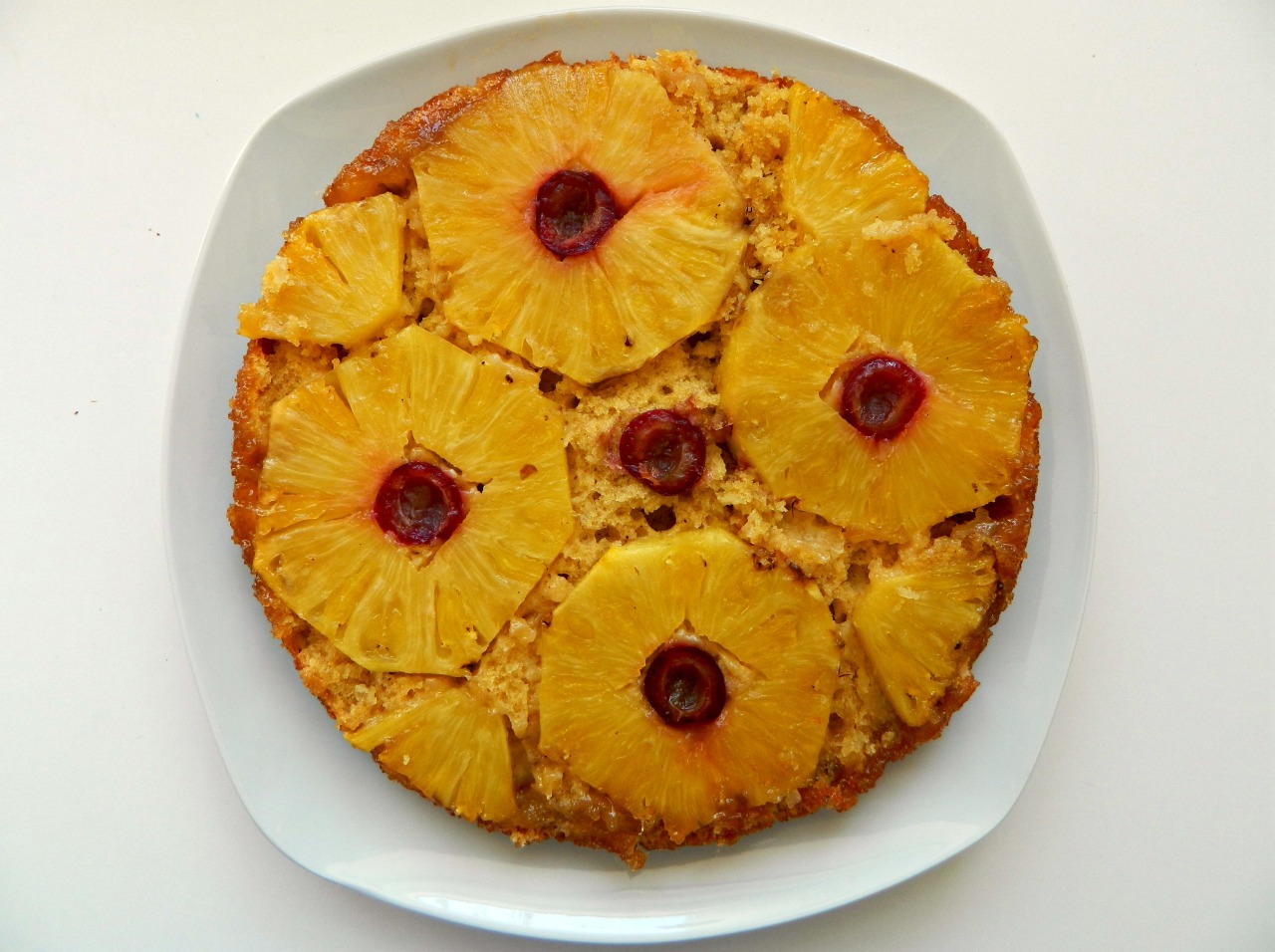 We had some pineapple to use up, so I went all retro today and made a pineapple upside down cake! :D
I increased the cake mix by 25%, but not the sugar, and added some coconut and nutmeg - oh, and because the pineapple was fresh, I didn’t have the...