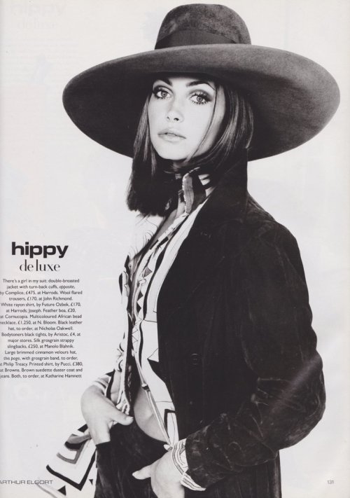 Hat: Philip TreacyShirt: PucciCoat &amp; jeans: Katharine HamnettVogue UK, December 1992Photographed