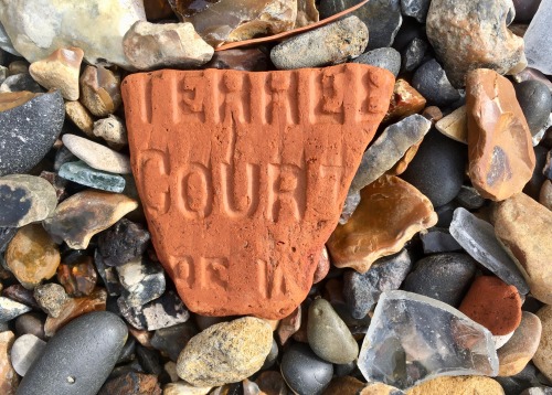 Mystery wording on a piece of Terracotta. Found on the Enderby House beach in Greenwich.