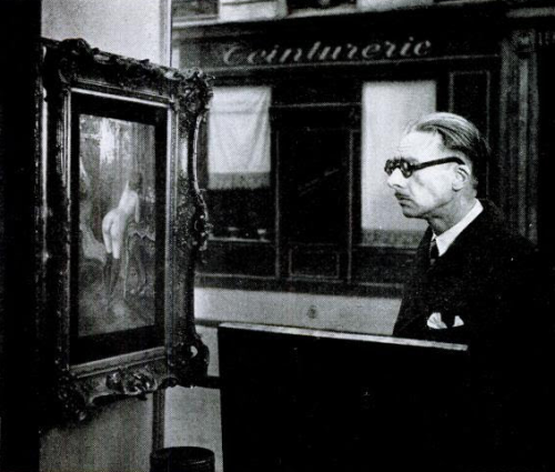 yesterdaysprint:In Romi’s antique shop on the Left Bank, Paris, photographer Robert Doisneau set up 