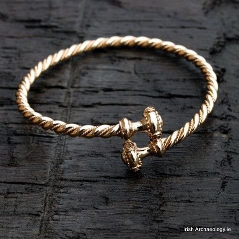 Fashioned out of bronze, this distinctive bracelet is inspired by prehistoric gold torcs. Gold 