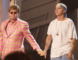 squid-in-a-party-hat:  I have no reason why. But here’s a picture of Eminem and Elton John holding hands. 