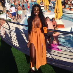 nipsndnaps:  weloveblackgirls:  This is offensive … What kind of melanin  Look at her. She’s the only Black person there and she’s shinning. 