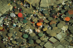 unrar:    An outdoor market with umbrellas,