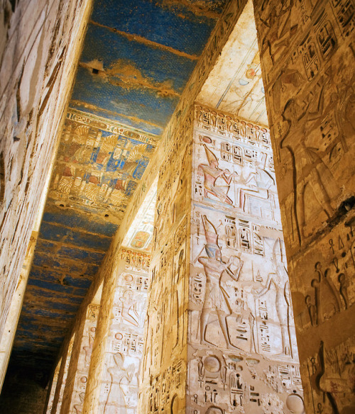 Medinet HabuPillars decorated with figures and hieroglyphs at the Mortuary Temple of Ramesses III, M