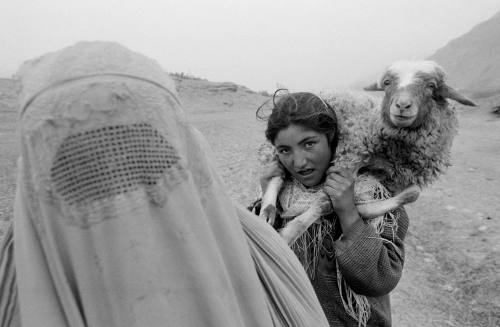 1st image: A mother and daughter returning home from work in the fields, Badakhshan Province, 2004. 