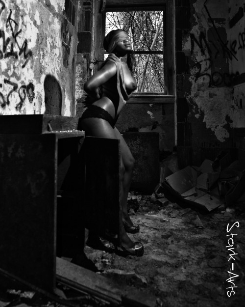 stark-arts:  black woman with red blindfold set - abandoned building 