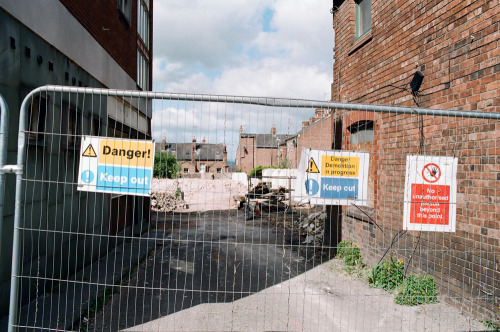 Demolition building work. Parkgate Road, Chester, Cheshire, England, UK. June 2015.