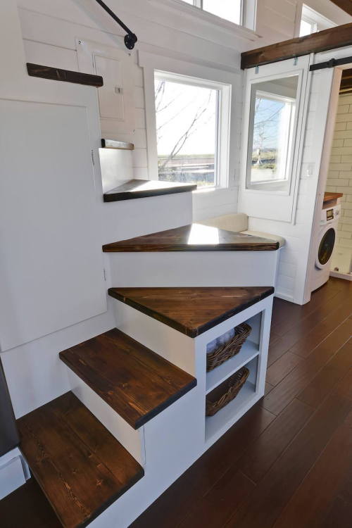 litbugi:This tiny home exudes spaces and has some great features such as a double sink in the bathroom, double loft space, lots of windows, and a washer/dryer unit: http://tinyhouseswoon.com/custom-tiny-living-home/