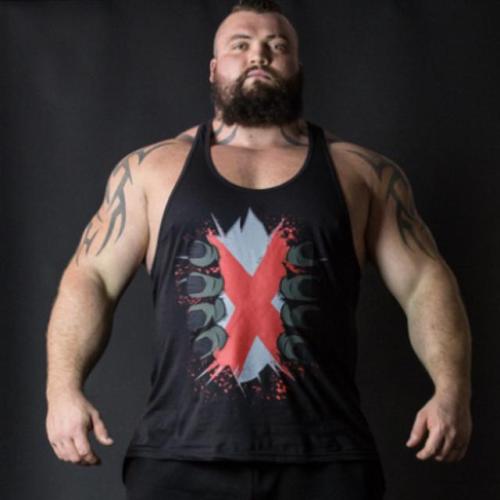 furonmuscle:Not particularly furry but he’s HUGE and he’s got that HUGE beard! UK strongman Eddie Ha