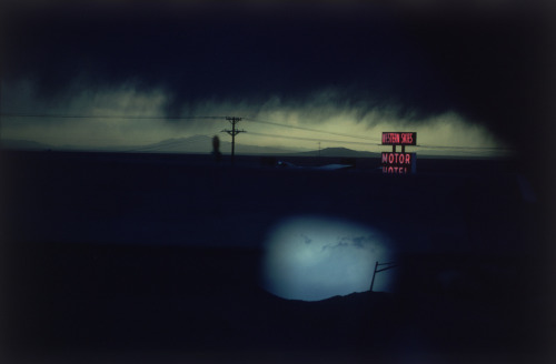 20aliens:  A cloudy night sky over the Western Skies Motor Motel in Colorado (1978)Ernst Haas