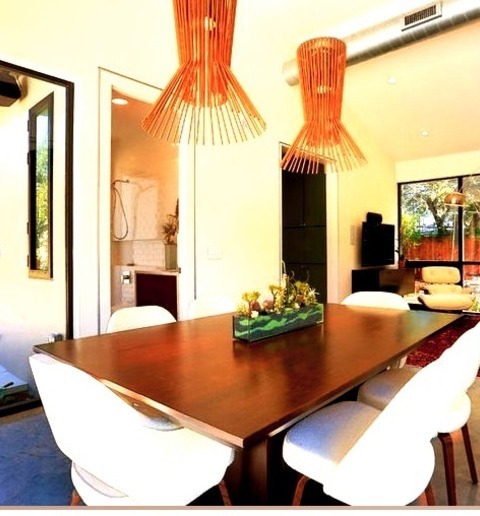 Great Room Dining RoomExample Of A Mid-sized Trendy Concrete Floor Great Room Design With Beige Walls
