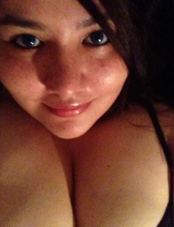 hubbyofachubby:  21thatfreckledgirl21:  Here, a smile. I think it looks goofy, that’s why I normally bite my lip. Happy Monday all, I’m off to work :)  Yowza! Take the hefty cleavage out of the equation and this girl is beyond cute. And single. American