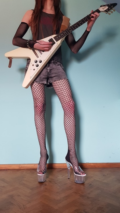 So I got the idea of doing a rock girl a while ago and I wanted to take pictures with my guitar as t