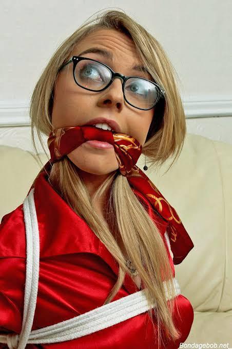 kiltedpatriot: mmpphhmmpphh: Bound and gagged brainy chicks turn me on Dang. :O Just love girls with
