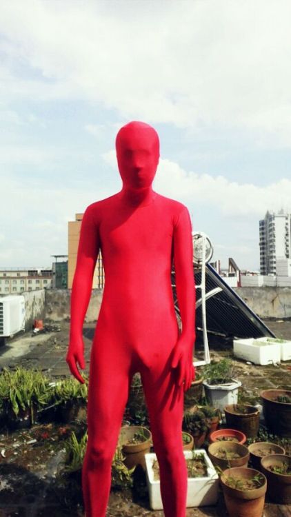 (China) Red Man on The Rooftop