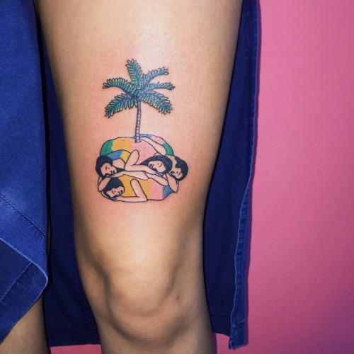 Kim Michey is a Korean tattoo artist. Her bright, animated designs are inspired by pop art and are o