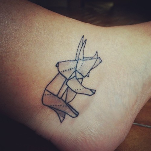 fuckyeahtattoos:  My origami dinosaur tattoo : Brooklyn. Done by Matt C. Ellis @ Triple Diamond Tattoo, New York.
