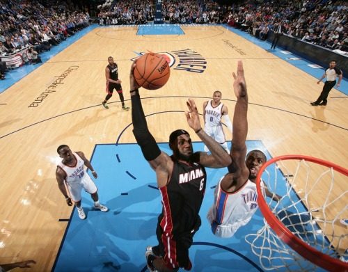 nba:  LeBron James #6 of the Miami Heat dunks against Serge Ibaka #9 of the Oklahoma City Thunder during a game at Chesapeake Energy Arena on February 20, 2014 in Oklahoma City, Oklahoma. (Photo by Nathaniel S. Butler/NBAE via Getty Images)