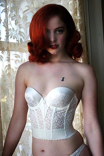 thelingerieaddict:  Carnival Low Back Strapless Ivory Longline Bra, via Dollhouse