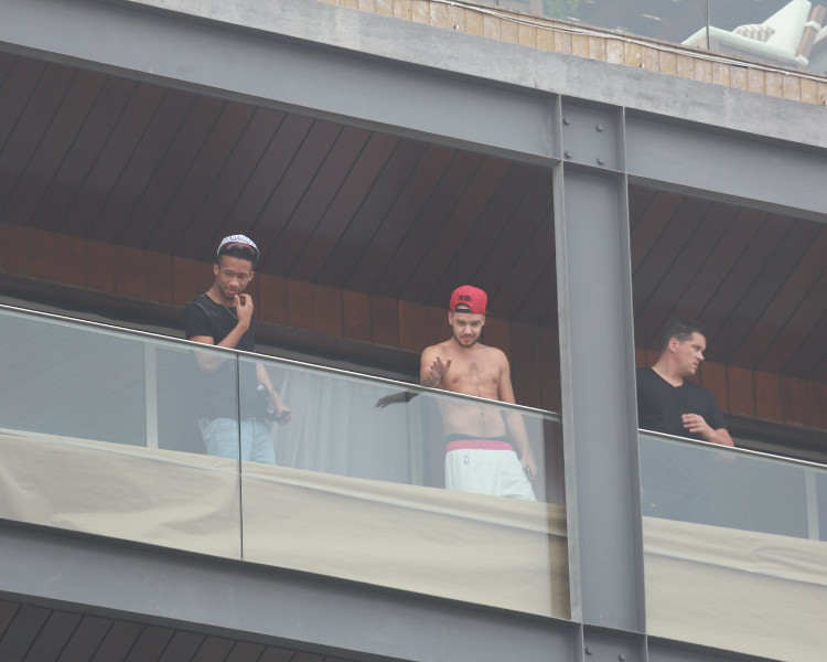 direct-news:  MORE - Liam shirtless at the hotel in Rio De Janeiro. (07/05/14) 