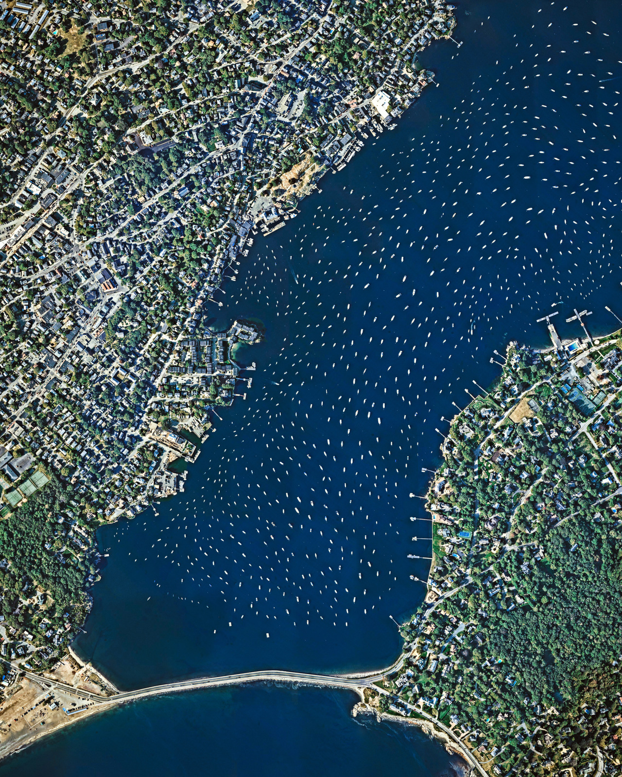 Hundreds of boats take harbor in a bay next to Marblehead, Massachusetts, a coastal town roughly 16 miles (25km) north of Boston. With a population of about 20,000, Marblehead has roots in commercial fishing, whaling, and yachting. In fact, it is...