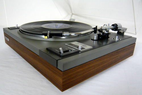 Pioneer PL-115 | Auto Return Belt DriveTurntable. Reconditioned and serviced. Semi automatic. Original vinyl removed and replaced with real wood walnut veneer. Mechanism cleaned and lubricated. The dust cover has been buffed and polished. Sure Hi Track