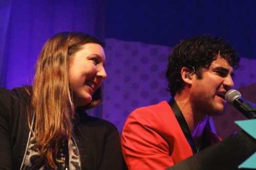 Darren Criss with a fan on stage in concert at The Fillmore in San Francisco, CA