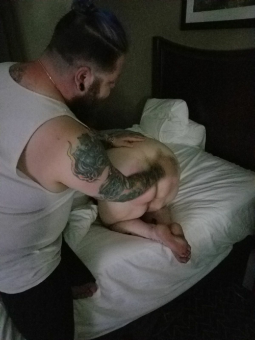 glitterdustedbitch:  Getting a good spanking from @punishedtattooedprincess and @thebeard81. Getting me nice and wet for daddy to fuck. @biggdaddy73