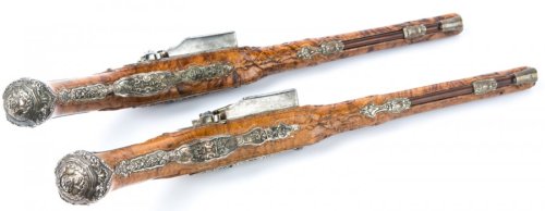 A pair of ornate flintlock dueling pistols originating from Italy, mid 18th century. Mid 18th centur