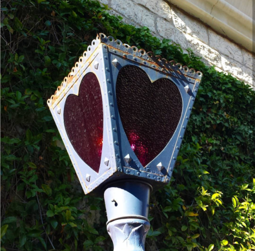 doorfus: happycorelovecore: Disneyland California [Image description: photo of a street lamp where t