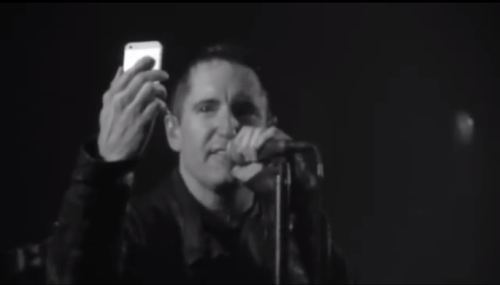 the-prettiest-hate-machine:  iforgothowtonormal:  Trent Reznor FaceTimes a fan live on stage, who was diagnosed with cancer and had a few weeks left to live. “As your time is running out, let me take away your doubt. We can find a better place in