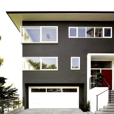 Exterior Stucco In San FranciscoExample Of A Mid-sized Minimalist Gray Three-story Stucco Flat Roof Design
