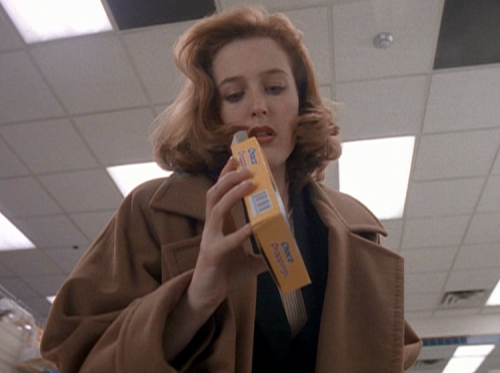 ursulastrausss: Scully looking good while eating choco droppings.