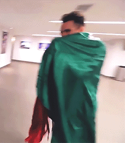 fighting-the-storm:  Brendon with his new choice of attire (aka a flag). 