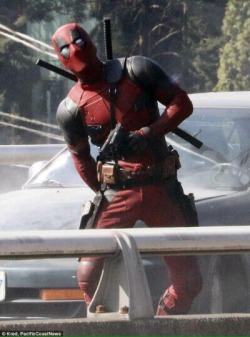 daily-superheroes:  http://daily-superheroes.tumblr.com/  I uh, I think wade just got shot in the ass