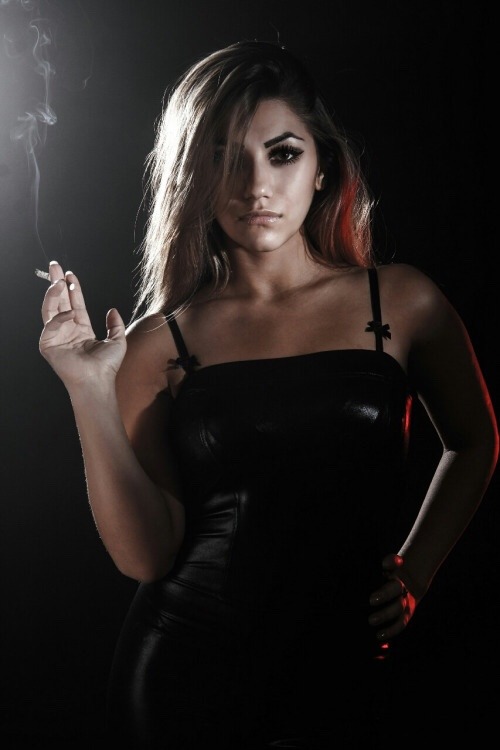 Smoking latex fetish lover