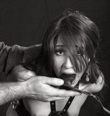 odalisque-uk:So invasive, and so degrading. Her face says it all. Gagging slightly