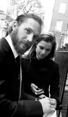 charlidos:  A beautiful photo of Tom &amp; Charlotte from 2012, by Zoe Norfolk. She wrote this about it (I haven’t seen those other photos, though. But could be for some event):  Recently I photographed the actor Tom Hardy - this is Tom giving me his