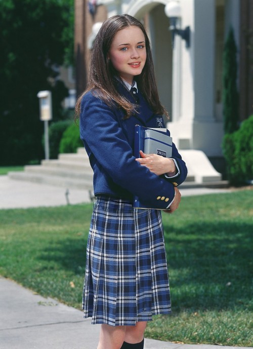 Alexis Bledel (born 1981), with one of her many books, in her role as Rory Gilmore in the WB televis