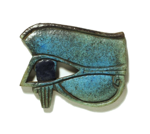 Amulet, Eye of Horus, God of Light, 1075 B.C. Egypt. Turquoise glazed and maganese-painted faience w