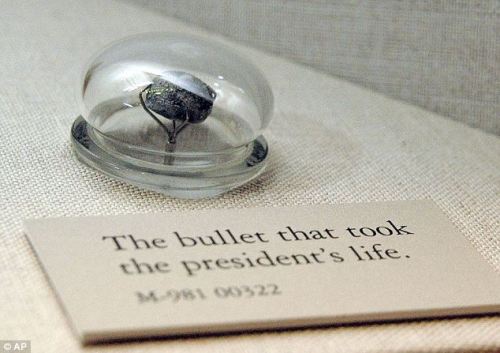 sixpenceee:  The bullet that killed Abraham Lincoln is mounted under glass in its new home at the National Museum of Health and Medicine. The lead ball and several skull fragments from the 16th president are in a tall, antique case overlooking a Civil