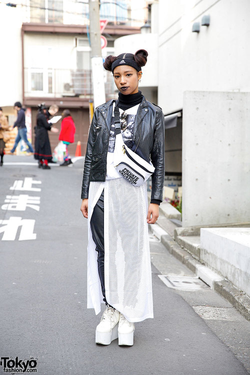17-year-old Risa on the street in Harajuku w/ a double bun hairstyle, resale leather jacket, pants f
