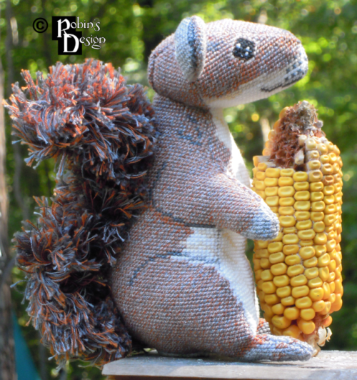 Meet Merlin the 3D cross stitched gray squirrel. His coat was cross stitched with blended colors to 