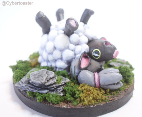 I sculpted a Wooloo rolling in some grass!