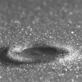 huffingtonpost:Raindrop Falling On Sand Looks Just Like A Tiny Asteroid